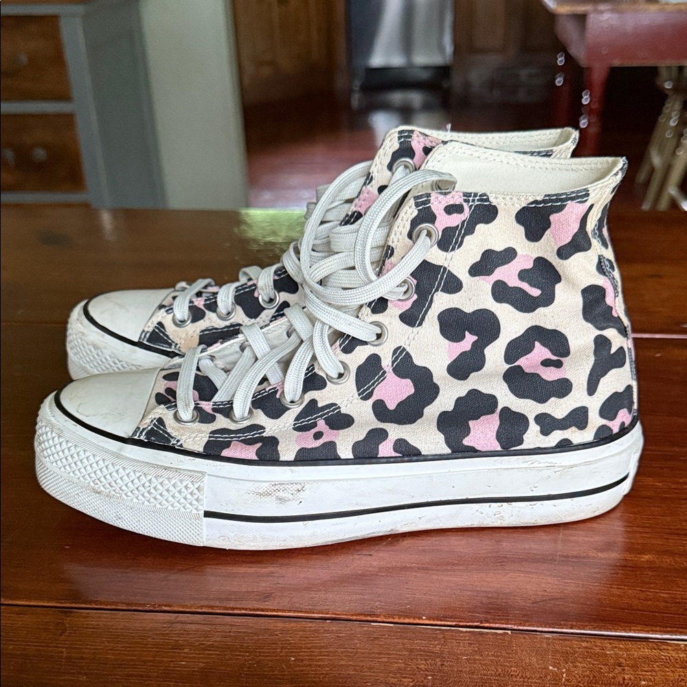 Stylish Pink and Black High-Top Converse Sneakers